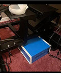 Heavy Duty ABS Plastic Enclosure Built Tough For Garage Mods And Home Upgrades positioned under a workstation for wiring protection.