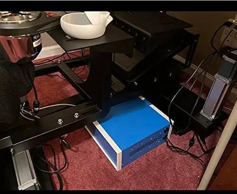 Heavy Duty ABS Plastic Enclosure Built Tough For Garage Mods And Home Upgrades positioned under a workstation for wiring protection.