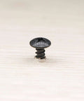 Installed view of a 100 Pieces No 8 Wood Screws Half Inch Truss Head Phillips Carbon Steel With Black Oxide Coating.