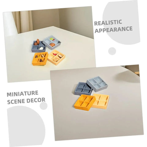 Four Piece Miniature Dollhouse Platter Set With Realistic Four Grid Resin Box For Candy And Nuts on a white tabletop