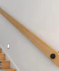 Adjustable Pine Wood Curtain Rod And Railing Support Kit For Indoor Outdoor Wall Mount Deck Patio Balcony Hardware Heavy Duty No Sweat Assembly Smooth Finish mounted on a wall near stairs.