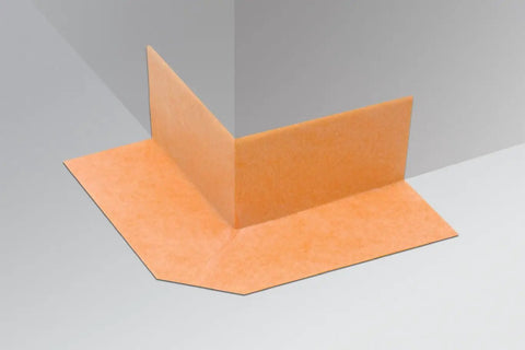 Kerdi-Kereck Preformed Waterproofing Outside Corner for Shower Systems, 90-degree fit in orange waterproofing material, in use