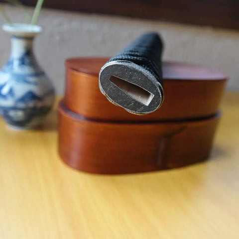 End view of Dope DIY Tsuka Sword Handle Kit Ten Point Two Inch For Samurai Katana showing hardwood core and alloy fittings.
