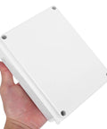 Cool 13 Piece I P65 Waterproof Junction Box Kit For Electrical Projects, showing white plastic enclosure in hand.