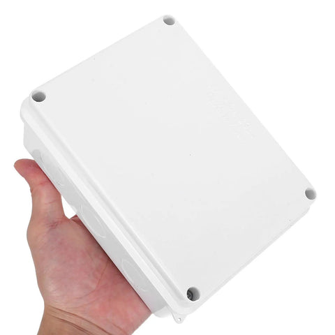 Cool 13 Piece I P65 Waterproof Junction Box Kit For Electrical Projects, showing white plastic enclosure in hand.