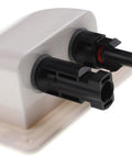 Side view of ABS UV Resistant Dual Cable Entry Housing For Solar Projects Waterproof Box With Photovoltaic Connector Ideal For RV Boat Camper Van Weatherproof White Entry Gland, featuring black connectors