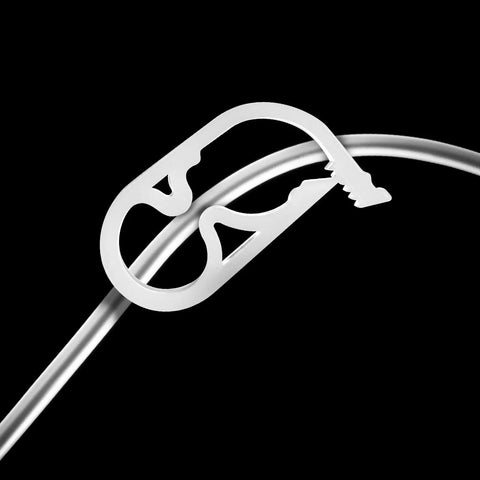 Close-up of a white plastic clamp on tubing, part of a Five Pack Adjustable Plastic Tubing Clamps For One Eighth To One Quarter Inch Tubing Water Flow Control Tube Clips For Beer Bottles Plumbing Instruments And Equipment White