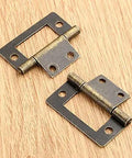 Antique Bronze Jewelry Box Hinges 38x20mm Two Pack Decorative Butt Hinges on wood surface