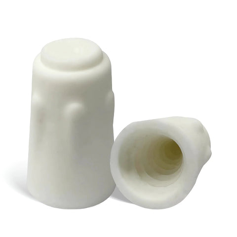 Pair of small white porcelain wire connectors; hollow ceramic caps for heat-resistant electrical connections (oven use).