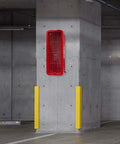Rugged Red Surface Mount Fire Extinguisher Cabinet With Integrated Hammer Tool For Five Pound Extinguisher Outdoor Dead Nuts Secure Lock Box mounted on concrete wall.