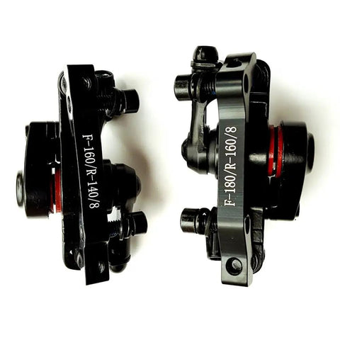 Hardcore Mountain Mechanical Disc Brake Kit With Front And Rear Calipers And Pro Levers Features Rapid Mount Setup And Tight Cable Routing For Sure Fire Stops And Crazy Control, showing black metal calipers.