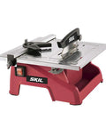Heavy Hitter 7 Inch Wet Tile Saw With Rust Proof Stainless Top And Adjustable Rip Fence For Smooth Cuts On Ceramic Porcelain And Stone Featuring A Water Tray That Keeps Blades Cool And Slashes Dust During Weekend Remodel Tasks, shown from the side