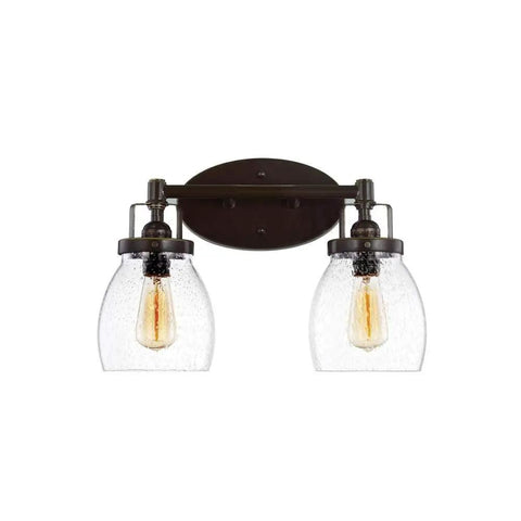 Two-light fixture with Heirloom Bronze finish, part of Four Light Wall Bath Vanity Fixture From Belton Collection, seeded glass shades.