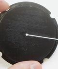 Hand holding 3D Printed Scroll Saw Throat Plate Replacement For 3921 3922 16 Inch Models With Small Clearance Holes For Ultra Fine Detail Cuts.