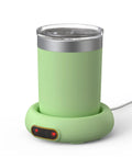 Keep Your Daily Brew Sizzling Hot This Smart Coffee Mug Warmer Uses An Ultra Smooth Metal Heating Base With Gravity Activated Control For Zero Fuss Desk Enjoyment, green mug warmer with USB cord.