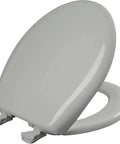 Ice Grey Round Toilet Seat With Slow Close And Easy Clean Hinges Durable Plastic Construction For Long Lasting Use Made In USA Modern Minimalist Look That Hides Stains And Reduces Noise In The Bathroom shown from a side angle