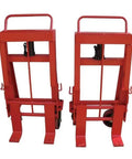 Heavy Duty Steel Machinery Mover Featuring A Hydraulic Hand Pump And Dual Forks, red steel frame for heavy equipment relocation.