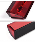 G-PLUS red lens LED third brake light with chrome housing, angled front view
G-PLUS red lens LED third brake light with black housing, side close-up view