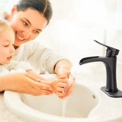 Mother and child washing hands near Matte Black Waterfall Bathroom Faucet With Pop Up Drain, Single Handle Deck Mount Vanity Tap