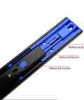 Close-up of push to open drawer slide with ball bearing, black metal track, showcasing rebound system details.