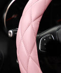 Sweet Baby Pink Steering Wheel Cover Soft Microfiber Leather close-up view showcasing quilted design and non-slip grip.