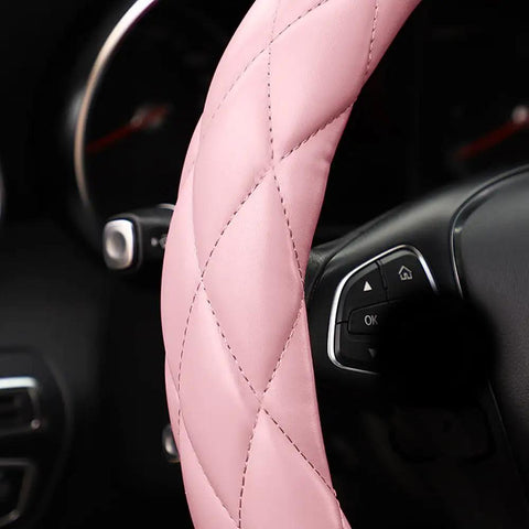 Sweet Baby Pink Steering Wheel Cover Soft Microfiber Leather close-up view showcasing quilted design and non-slip grip.