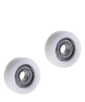 Four Pack Heavy Duty Nylon Roller Idler Bearing Pulleys Running Smooth As Butter With Round Groove Design For Quiet Sliding Cabinet Doors And Furniture Hardware Jobs Built Tough For Everyday Use - close-up of two durable nylon wheel rollers.