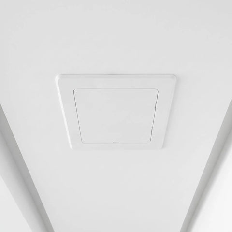 No Drill ABS Access Panel For Drywall Peel Stick Ceiling Pipe Cover Hides Nasty Pipes, mounted on white ceiling.