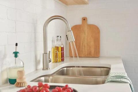 Kitchen scene with Flute Pull-Down Kitchen Faucet With POWERINSE Technology, 3-Function Spray, high arc gooseneck, stainless finish.