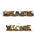 Top Tier Wall Mounted Coat Rack Featuring Durable Brass Hooks And Streamlined Nordic Shape For Your Busy Hallway with hunting theme.