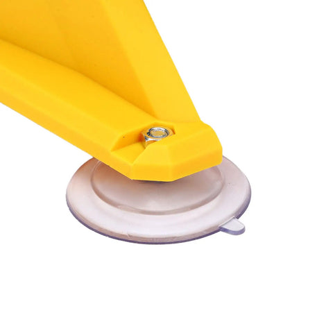 Detail of yellow suction cup base for Jeffergarden Cordless Mini Bench Grinder With Dual 2.8 Inch Grinding Wheels And Four Suction Cups For Sanding Sharpening Polishing Featuring Powerful 5500 Rpm Motor And 150 Watts Of Raw Power Ideal for Quick Jobs on The Go.