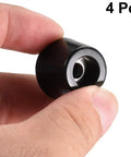 Hand holding one Durable Rubber Feet Bumpers With Metal Washer Insert 4 Pack Black 0.91 Inch Bottom Width 0.71 Inch Top Width 0.63 Inch Height