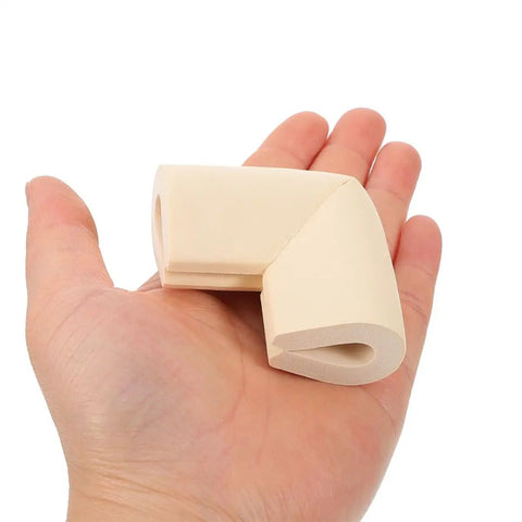 Beige Corner Protectors 20 Pack For Picture Frames, TVs, Mirrors And Fragile Art, held in hand for size illustration