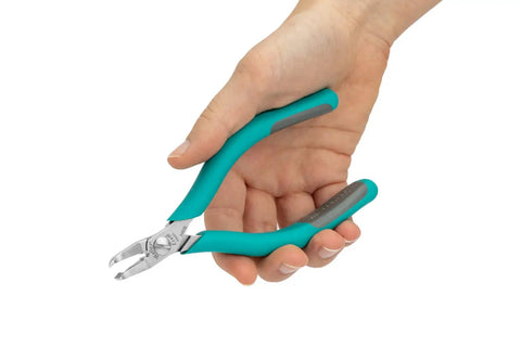 Hand holding a 5 Inch Angled Tip Cutter with Ergonomic Co Molded Grip for SMT Lead Trimming, Durable Eremadium Tool Steel, EMOS Stop.