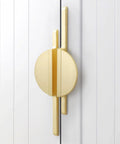 Brushed Gold Half Moon Cabinet Pulls 64mm Center to Center, 7.5 Inch Overall Length, installed on white cabinet doors