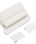 Mushroom Shaped Four Hole Paper Punch With Built In Ruler And Positioning Posts Metal Handheld Punch displayed on a flat surface