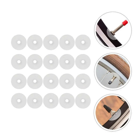 30 Pack Heavy Duty Mountain Bike Valve Stem Pads For Hella Secure Seals And Zero Leaks Quick Swap Tubeless Tire Guard Kit For Sick Rides And Badass Trail Grip, white pads laid out for use on bike wheels.