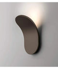 Modern Led Wall Sconce Featuring Smooth Iron Body And Soft Acrylic Diffuser, sleek wall light fixture casting warm glow.