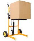 Heavy Duty Hydraulic Manual Lift Stacker With 440 Lb Capacity And Adjustable Forks lifting a cardboard box.