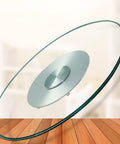 Premium Tempered Glass Lazy Susan Turntable Featuring A Sleek Swivel Design on a wooden table with a blurred background.