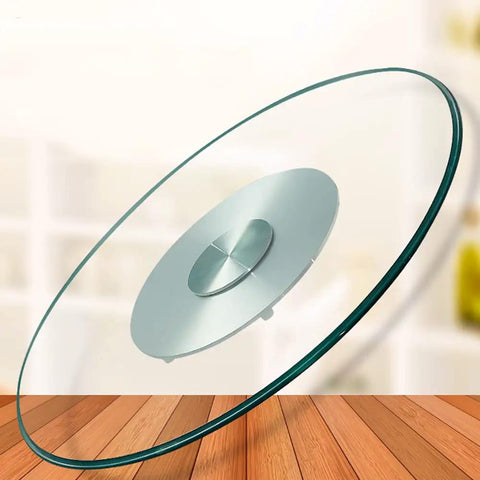 Premium Tempered Glass Lazy Susan Turntable Featuring A Sleek Swivel Design on a wooden table with a blurred background.
