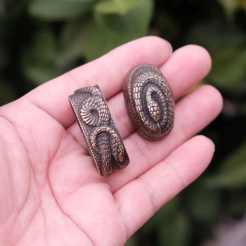 Close-up of Koshirae Tsuba Fuchi Kashira Menuki Set, snake design, premium alloy in black bronze, fitting 68 85 size swords