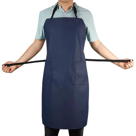 Person wearing Waterproof Rubber Vinyl Apron With Two Big Pockets For Dishwashing And Grooming Lightweight PU Workhorse Apron