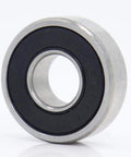 Top Rated 608 Hybrid Ceramic Ball Bearings for Skateboards And Scooters Featuring Si3N4 Balls For Smoother Spins With Low Friction And High Durability Perfect For Fast Motors And Industry Spindles At 9x22x7mm Size - Close-up view of ceramic ball bearing with sealed design.