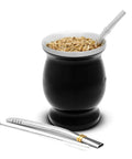 Level Up Your Daily Sip Routine With This Sleek Double Wall Stainless Steel Yerba Mate Cup Set Featuring Two Reliable Bombillas And A Hassle Free Cleaning Brush, featuring a black yerba mate gourd with stainless steel straw and loose tea.