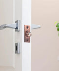 Super Cool Adjustable Ball Door Catches With Roller Beads on a white door. Easy setup and heavy-duty locking mechanism.