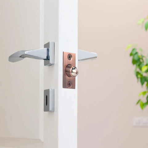 Super Cool Adjustable Ball Door Catches With Roller Beads on a white door. Easy setup and heavy-duty locking mechanism.