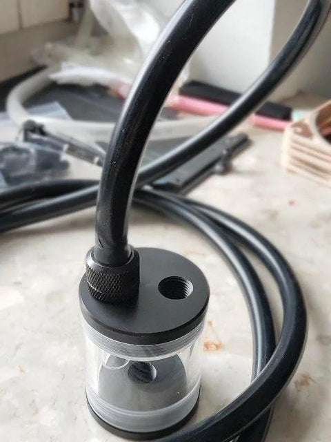 ZY-hosetube silicone tubing, black, 1/2 in ID × 5/8 in OD, connected to a clear inline chamber.