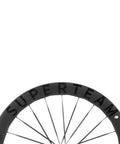 Close-up of Carbon Disc Wheelset S All D28 50 Tubeless With Carbon Spokes 700C showing top view with brand logo on rim
