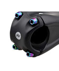 Close-up of installed Rainbow Titanium Alloy M5x16mm 18mm Tapered Head Allen Hex Bolts With Washer on bike stem, 6-pack.